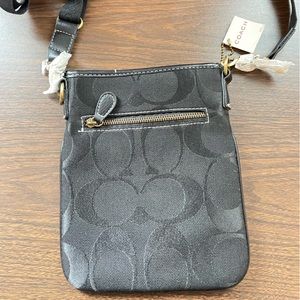 Coach canvas black sling bag
